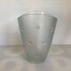 Vase with polka dots, Italy, round with relief.