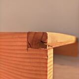 Wooden shelf with unroller wipes everything