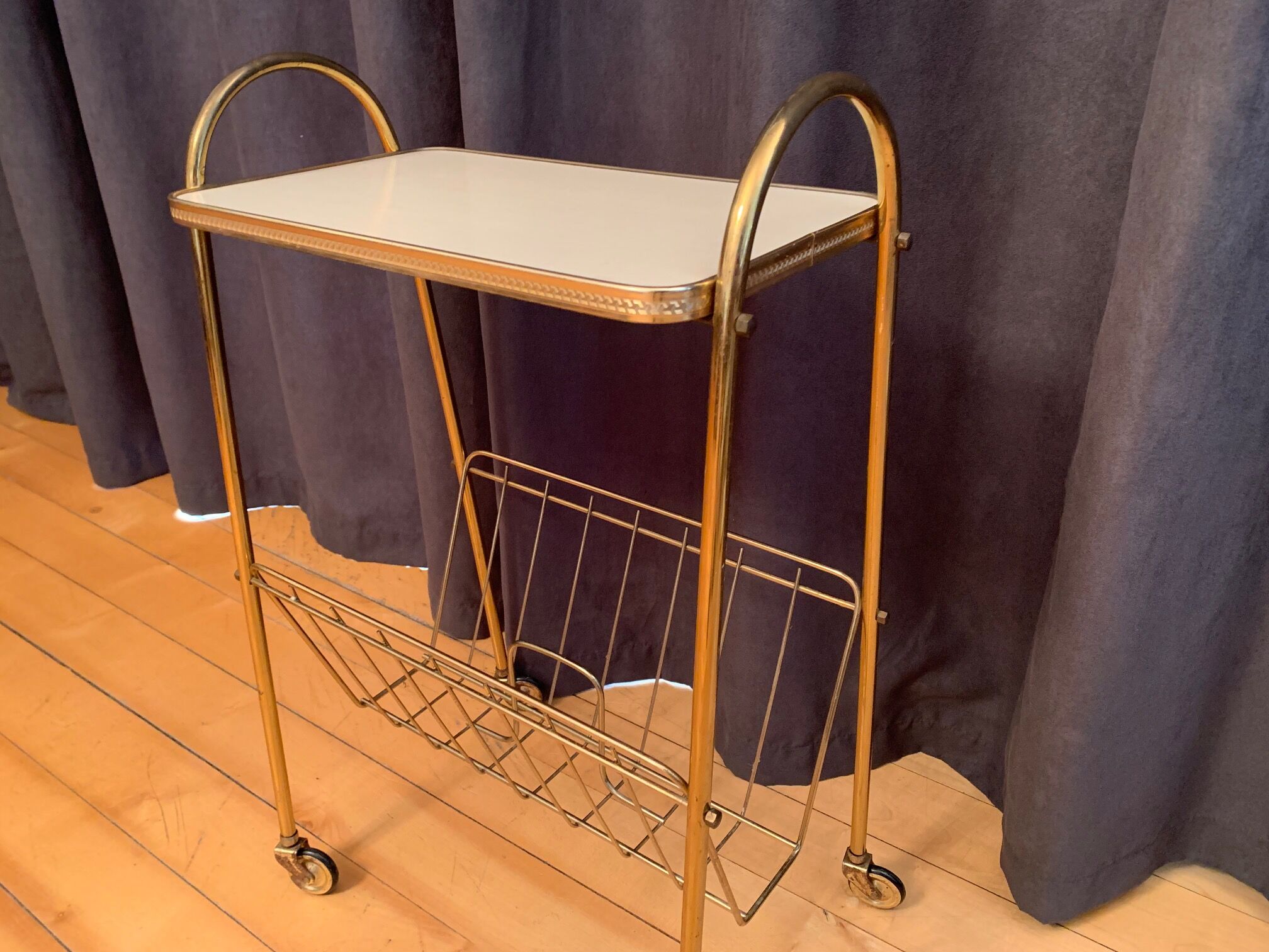 Mobile newspaper holder, 1960s