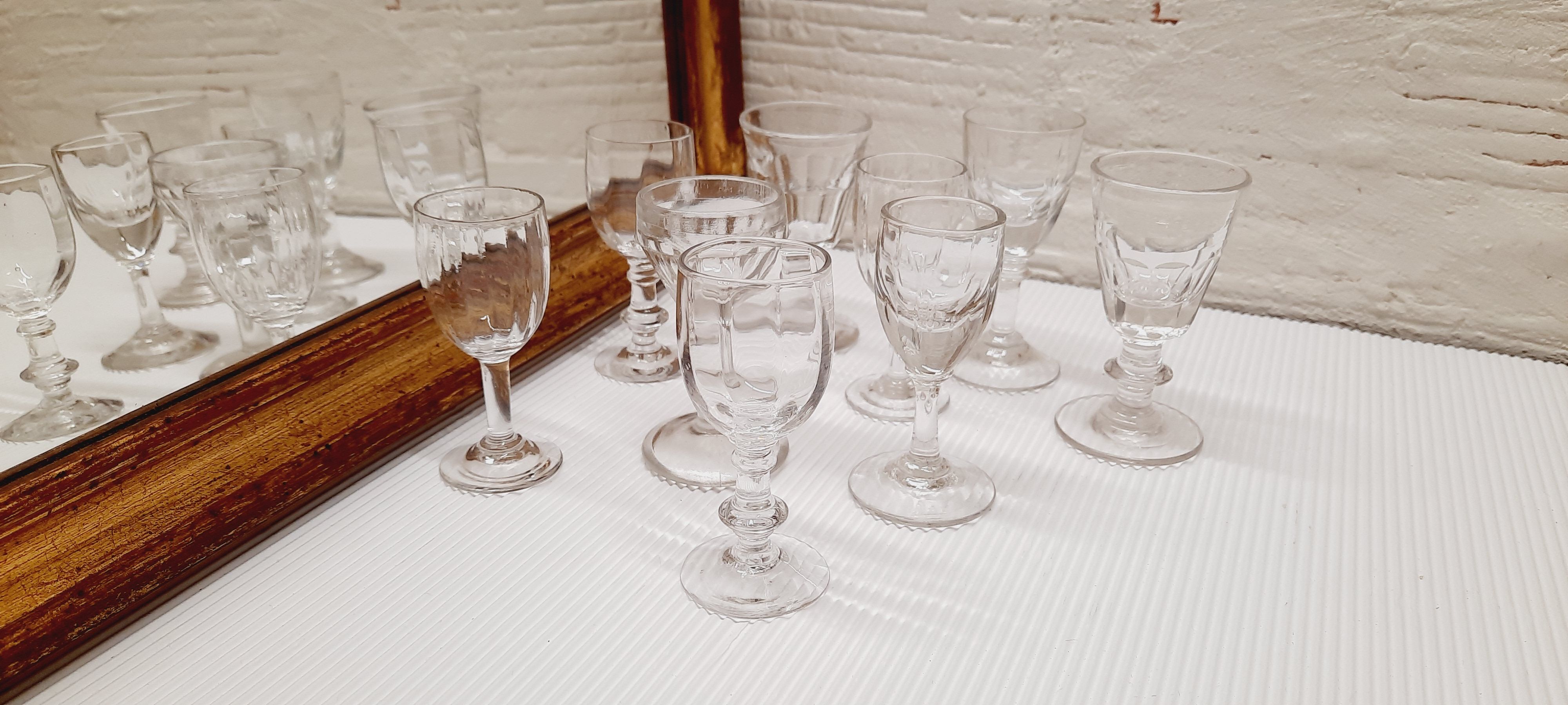 Lot 9 mismatched digestive glasses
