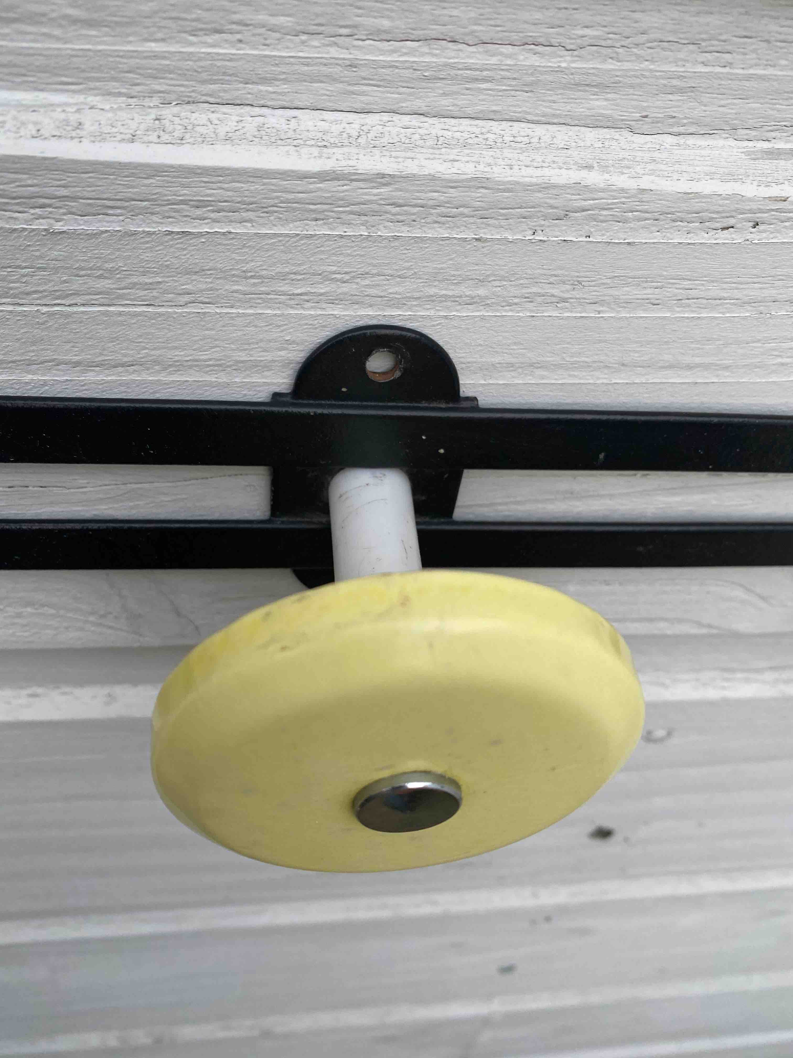 Yellow metal coat door