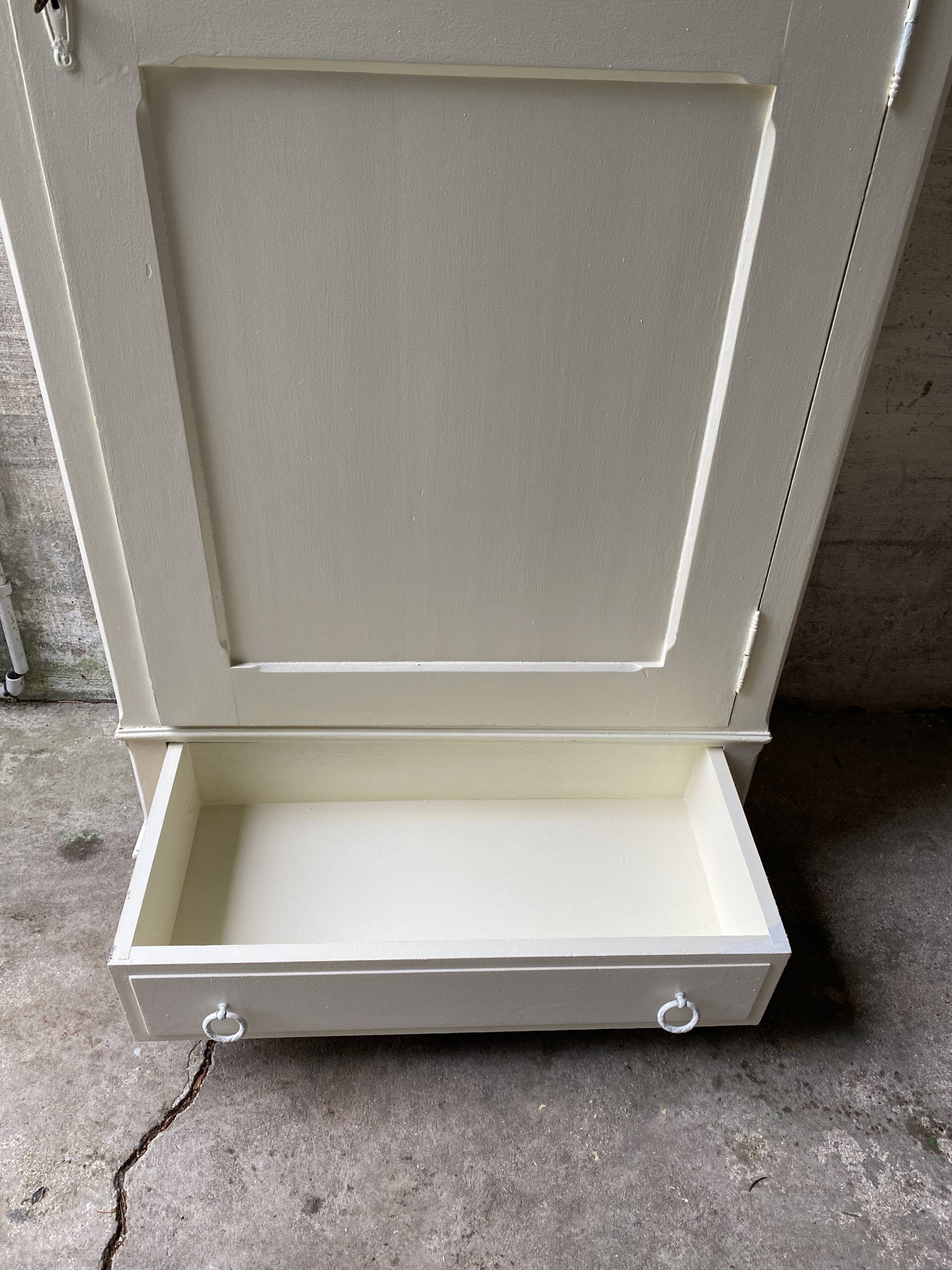 Vintage Parisian wardrobe, pale yellow lacquer, one door, three shelves, one drawer