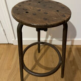 Old industrial stool in wood and metal
