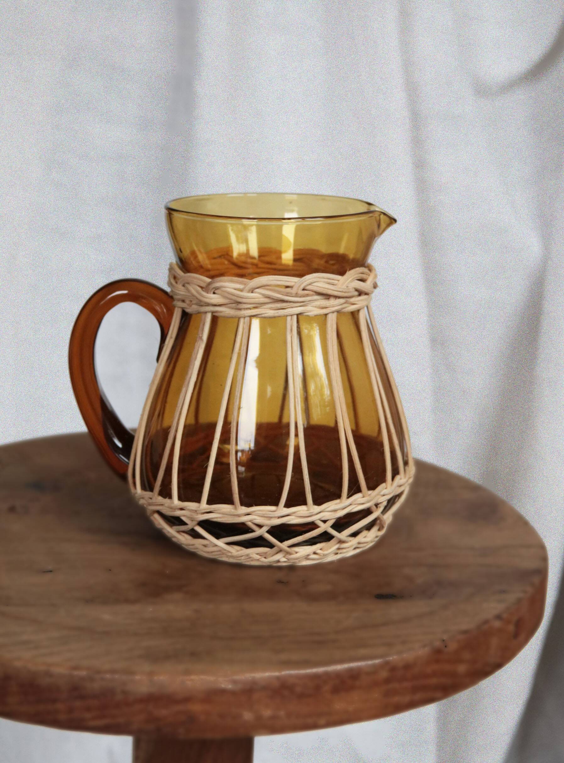 Amber glass and wicker carafe