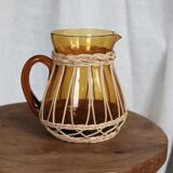 Amber glass and wicker carafe