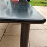 Old vintage wooden coffee table with tubular base