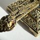 Patterned solid bronze hand candle holder