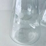 Set of three Pyrex glass chemistry bottles