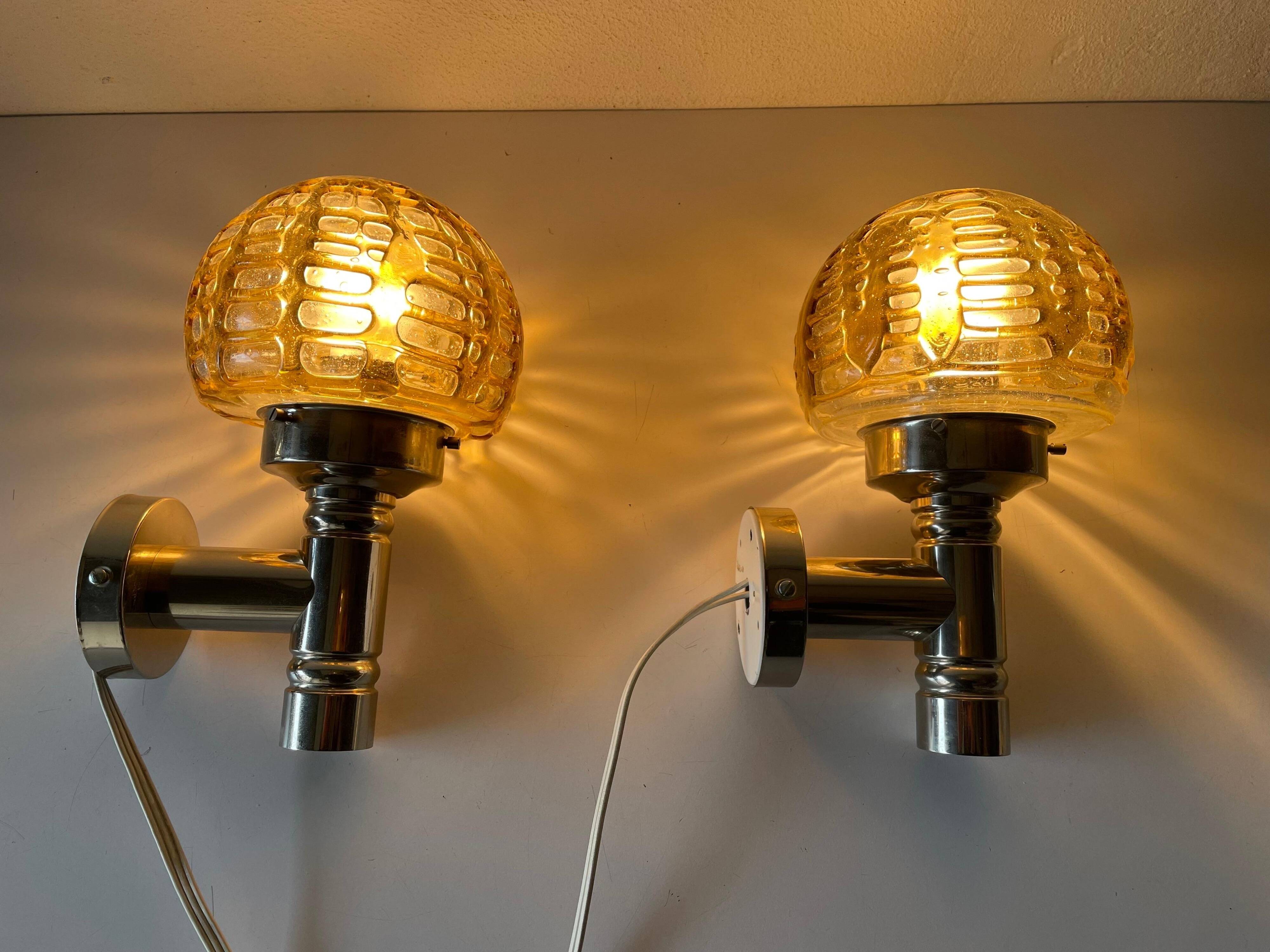 Rare pair of blown glass and chrome wall lights by Doria, 1960s, Germany.