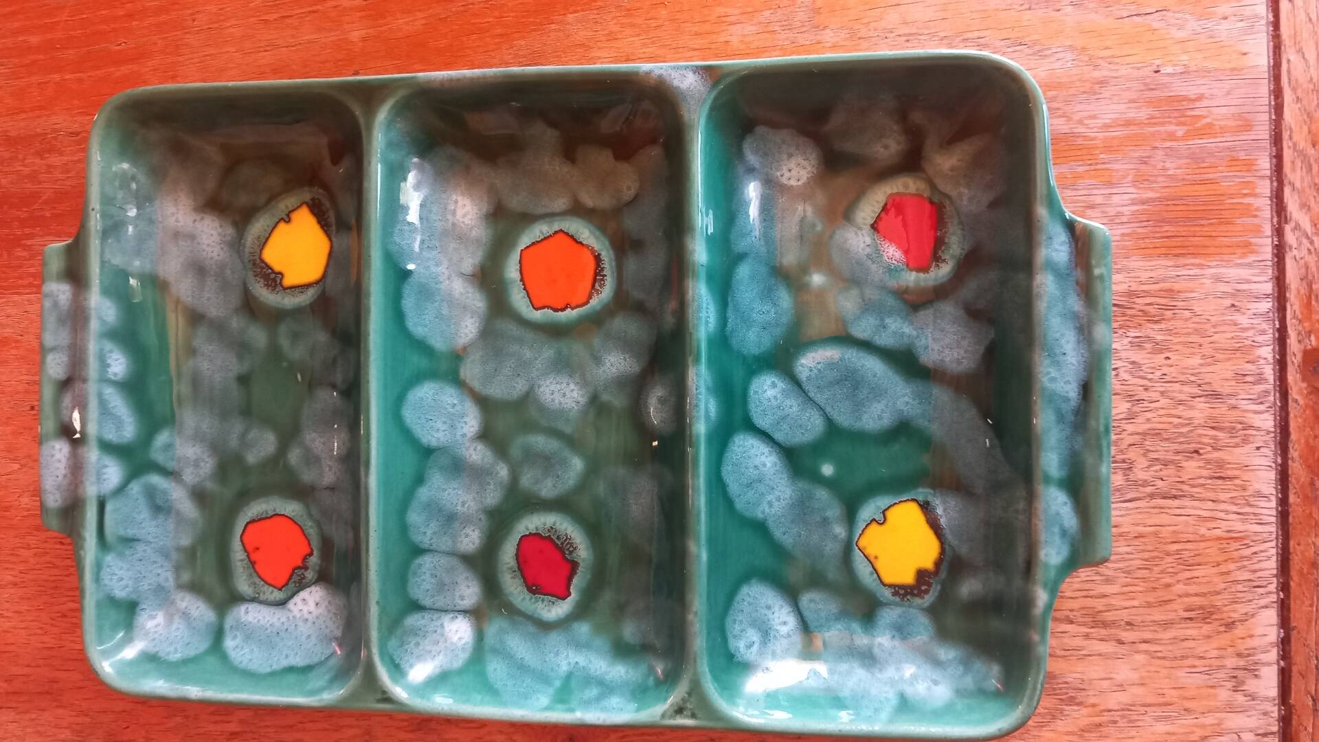 Glazed ceramic dish with compartments attributed to Poët-Laval.