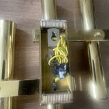 Tubular wall sconces in brass, Italian design from the 1970s, attributed.