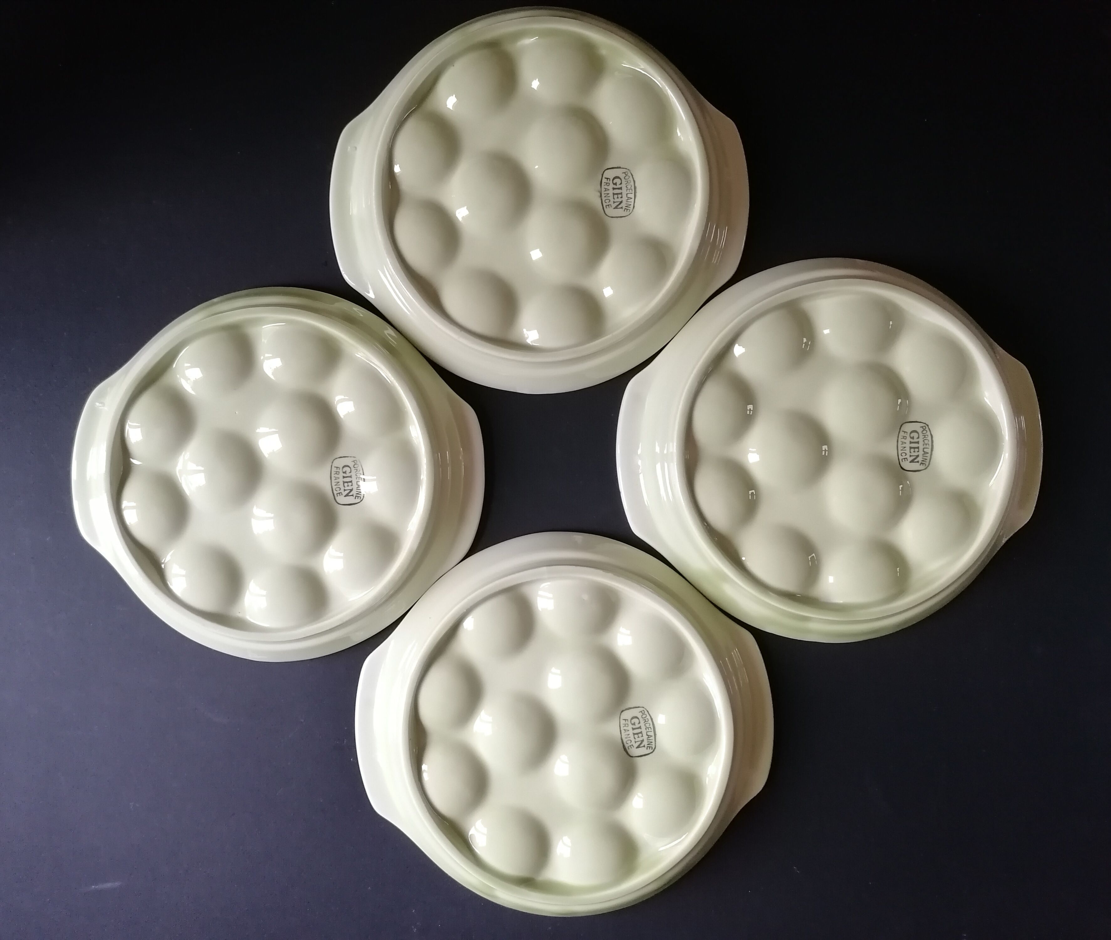 4 plates with gien porcelain snails