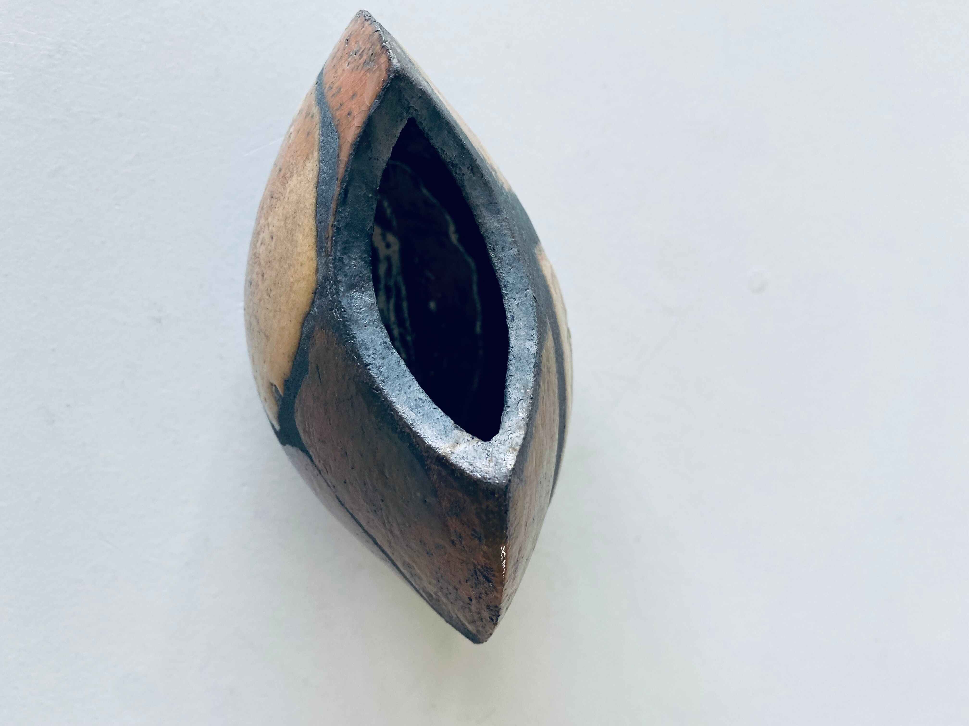 Enamelled ceramic lens vase