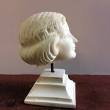 Plaster head of young girl from the 1930s