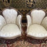 Paire de fauteuils bergères rocailles Louis XV
