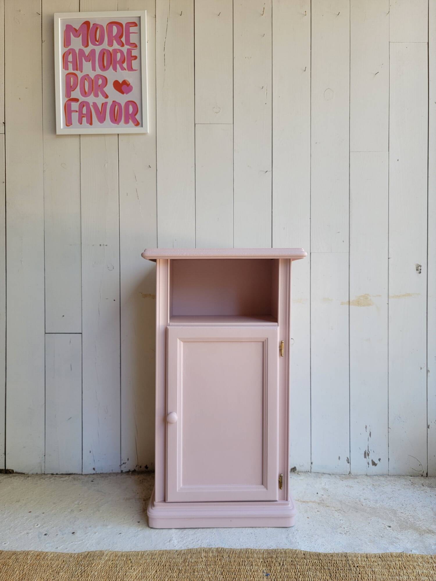 Antique bedside table revamped in pink.