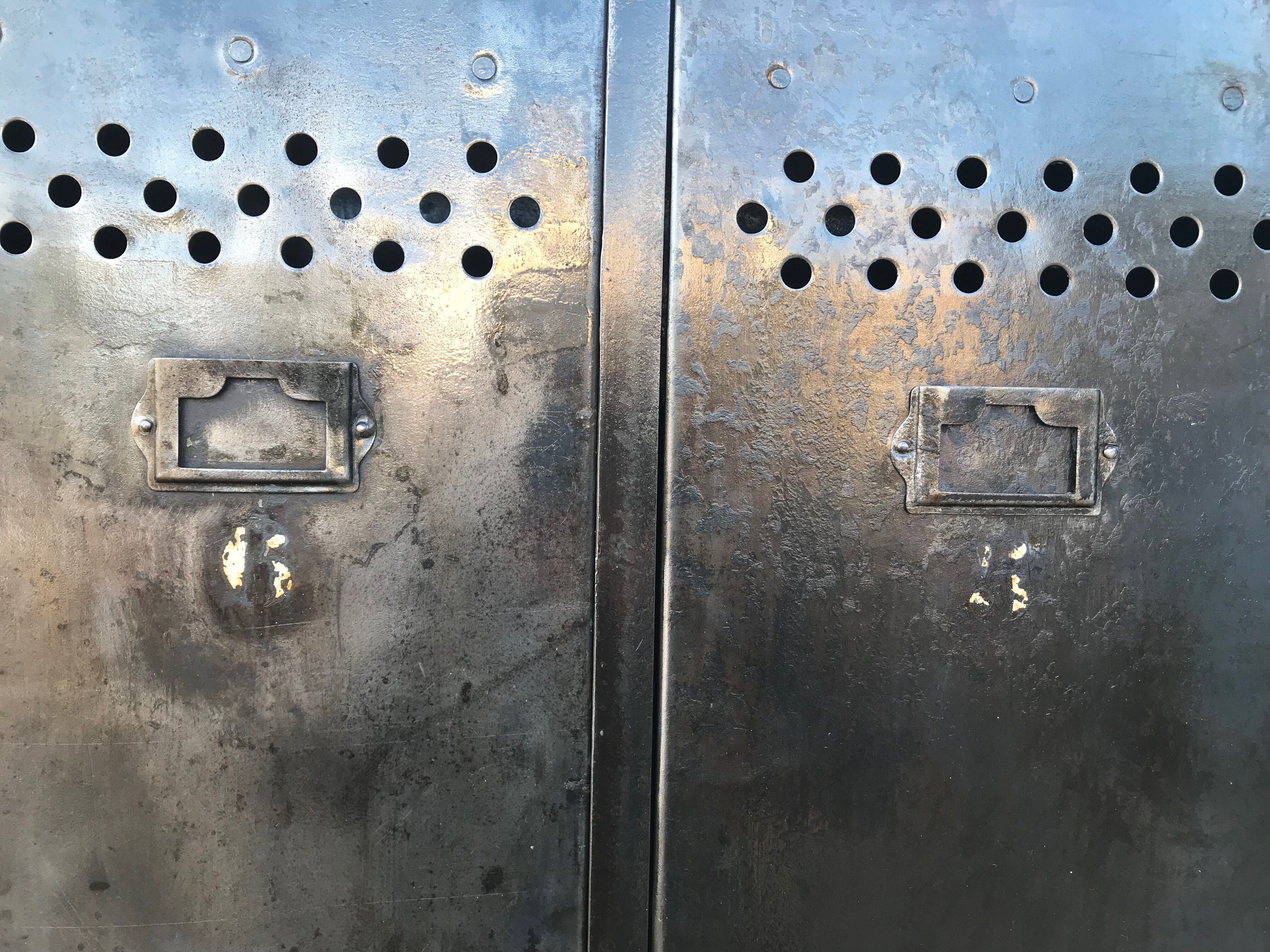 Antique riveted metal cloakroom