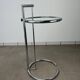 Chrome and glass design side table, adjustable.