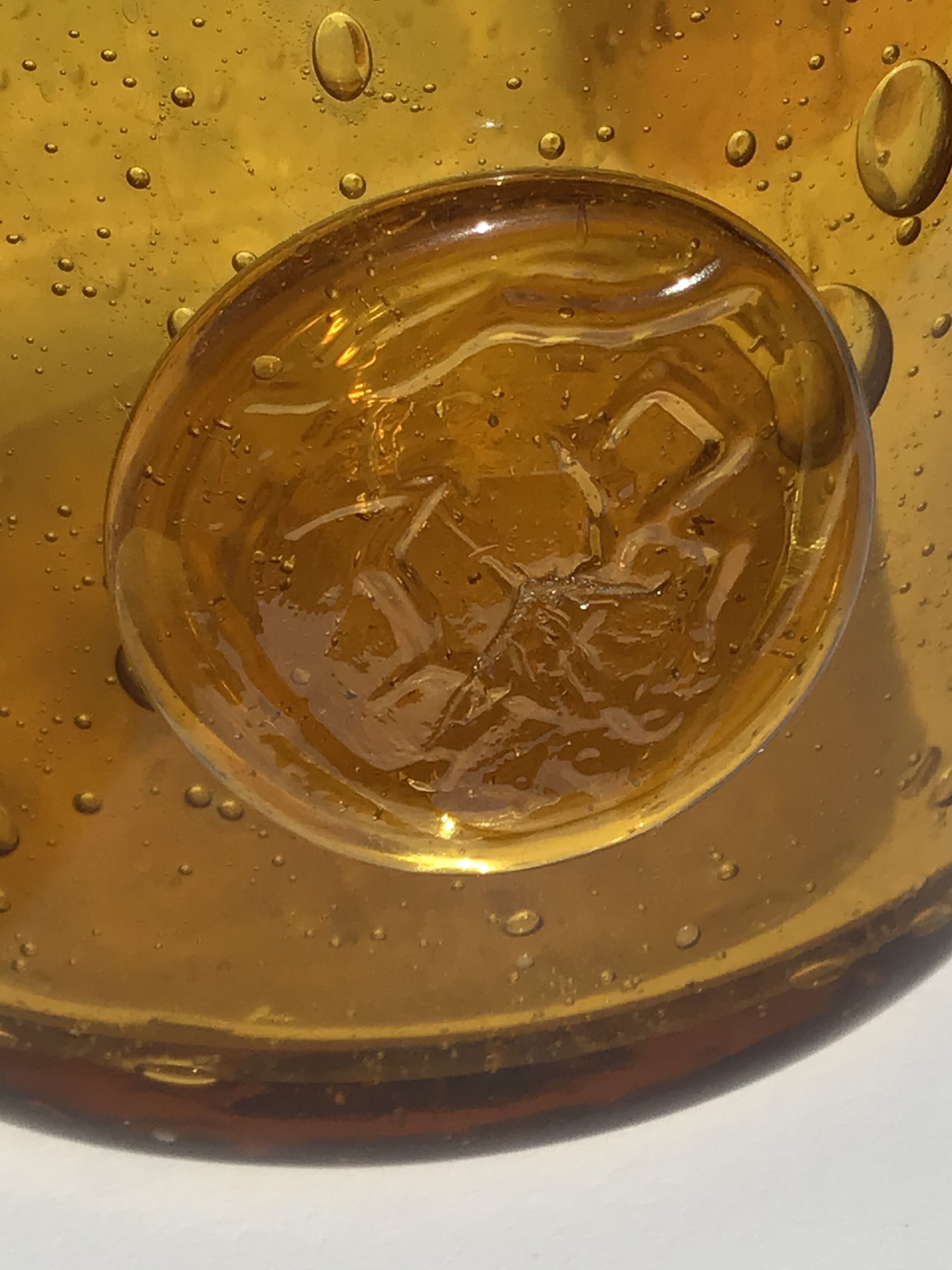 Amber bubbled glass jar La Rochère
