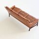 Canapé scandinave trois places en palissandre et cuir marron Danemark 1960