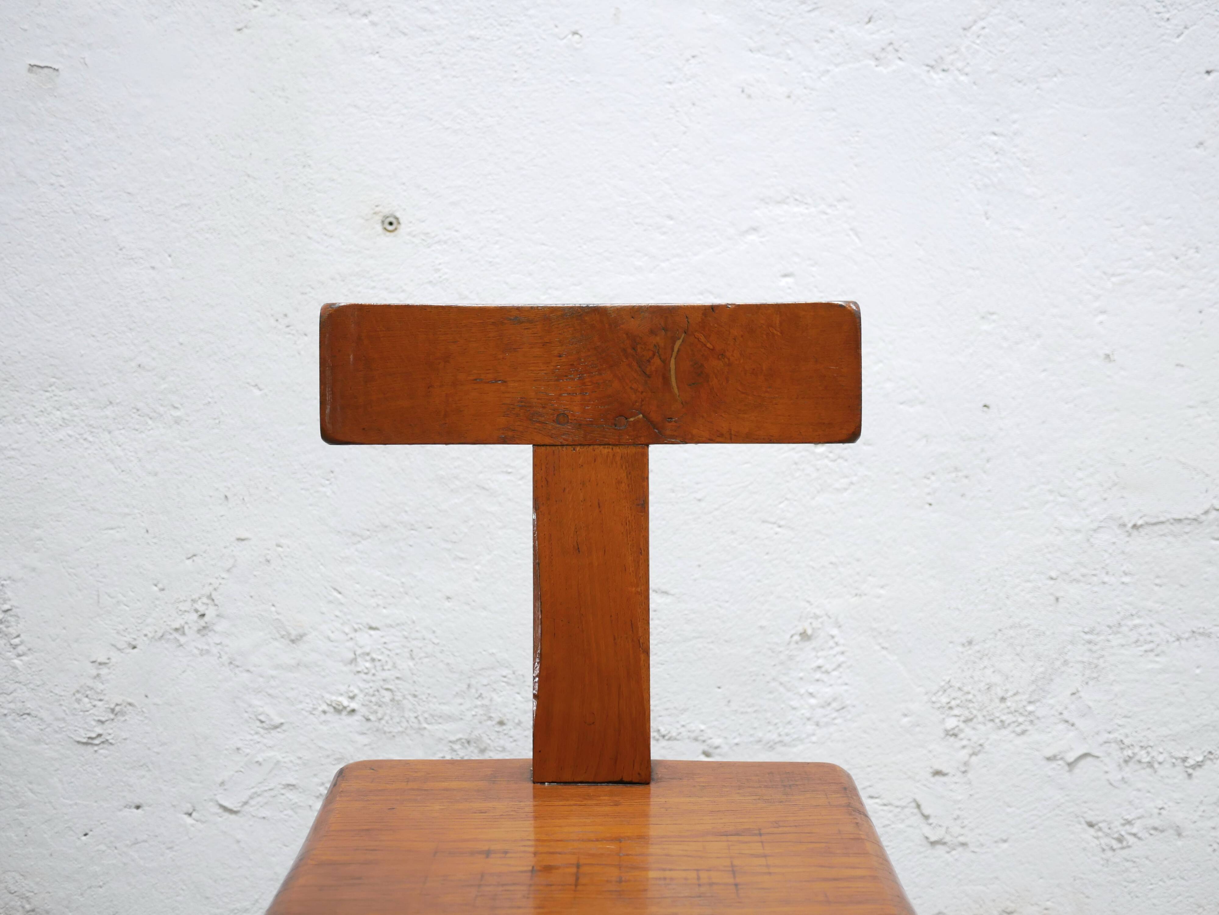 Vintage brutalist wooden T chair
