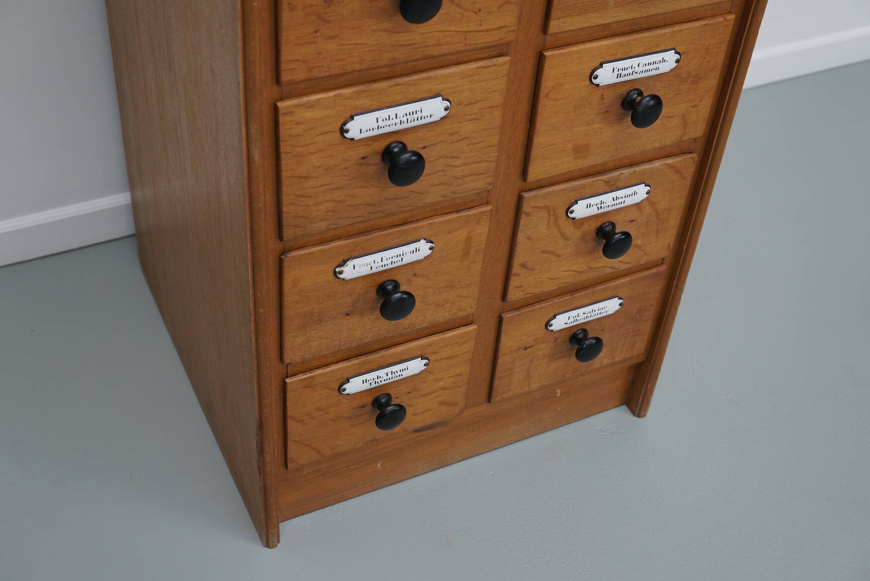 German Oak Apothecary Cabinet with Enamel Shields, 1940s