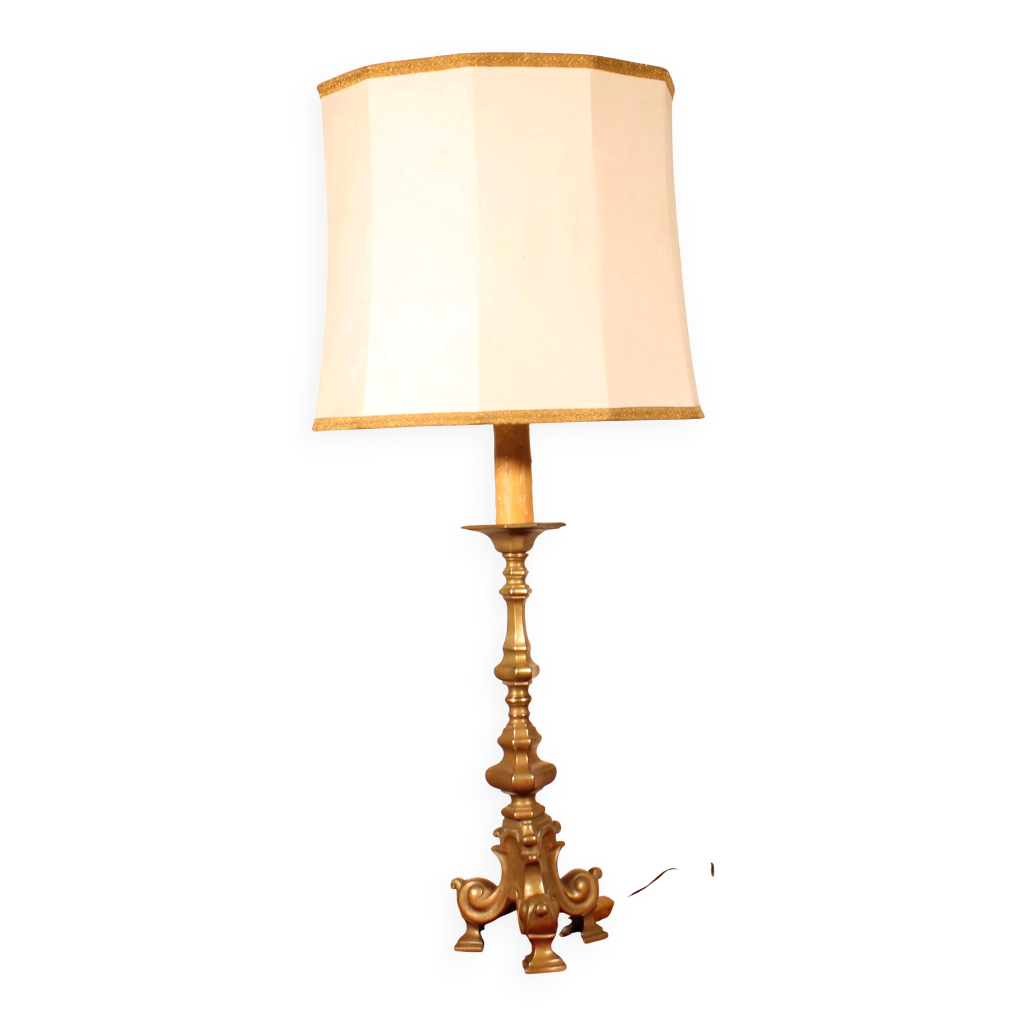bronze candlestick from the 18th century converted into a lamp with its shade