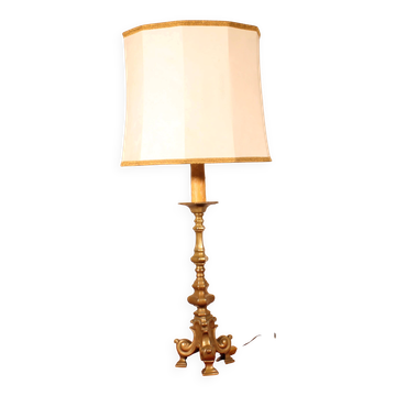 bronze candlestick from the 18th century converted into a lamp with its shade