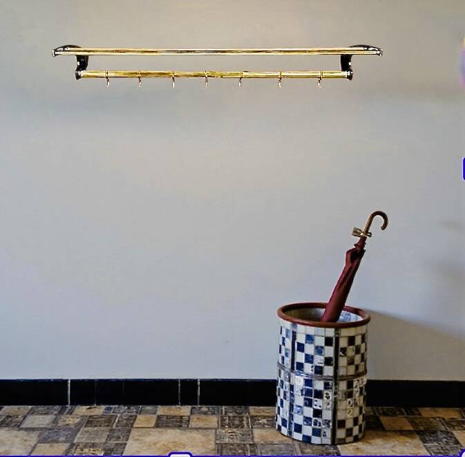 Vintage wall-mounted coat rack in black bakelite and brass – 1950s