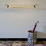 Vintage wall-mounted coat rack in black bakelite and brass – 1950s
