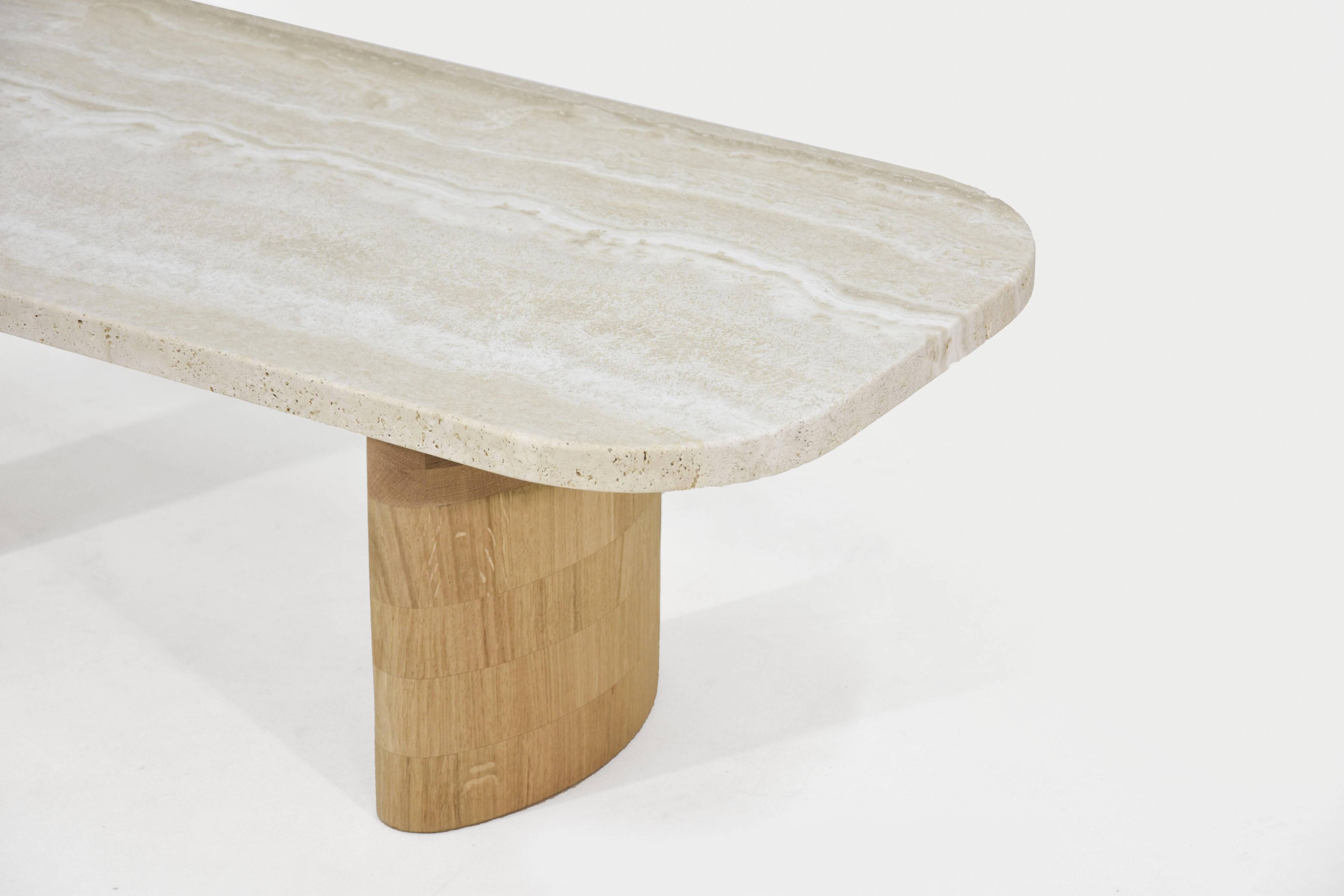 Coffee table in travertine and oak.