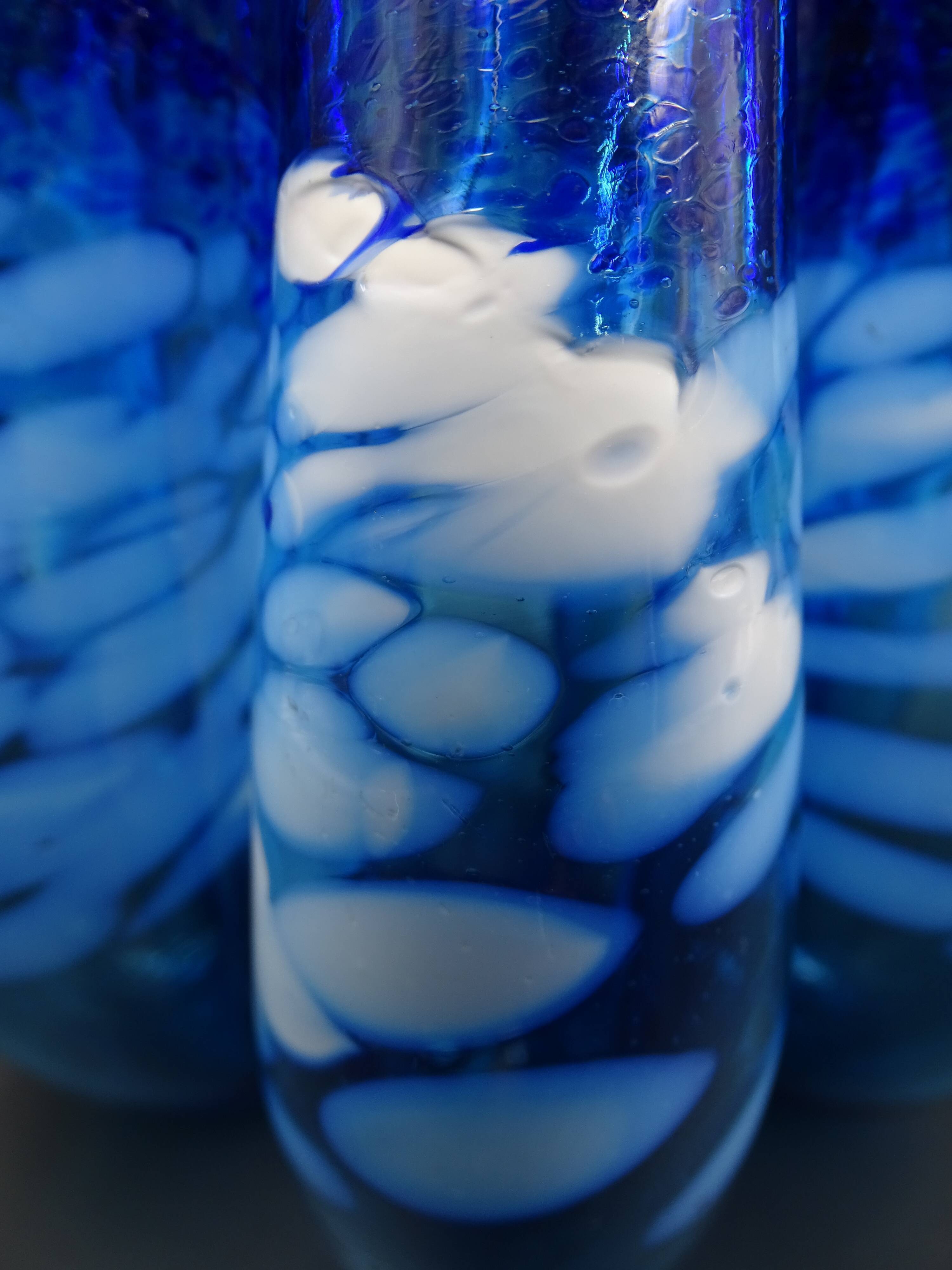 Blue glass vase and touches of white