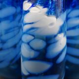 Blue glass vase and touches of white