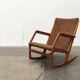 Mid-century model 100 rocking chair in Danish teak by Søren Georg Jensen for Kubus Møbler, 1960s.