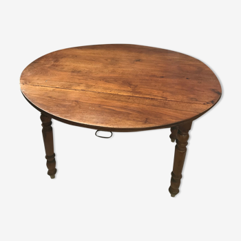 Oval wooden table with shutter