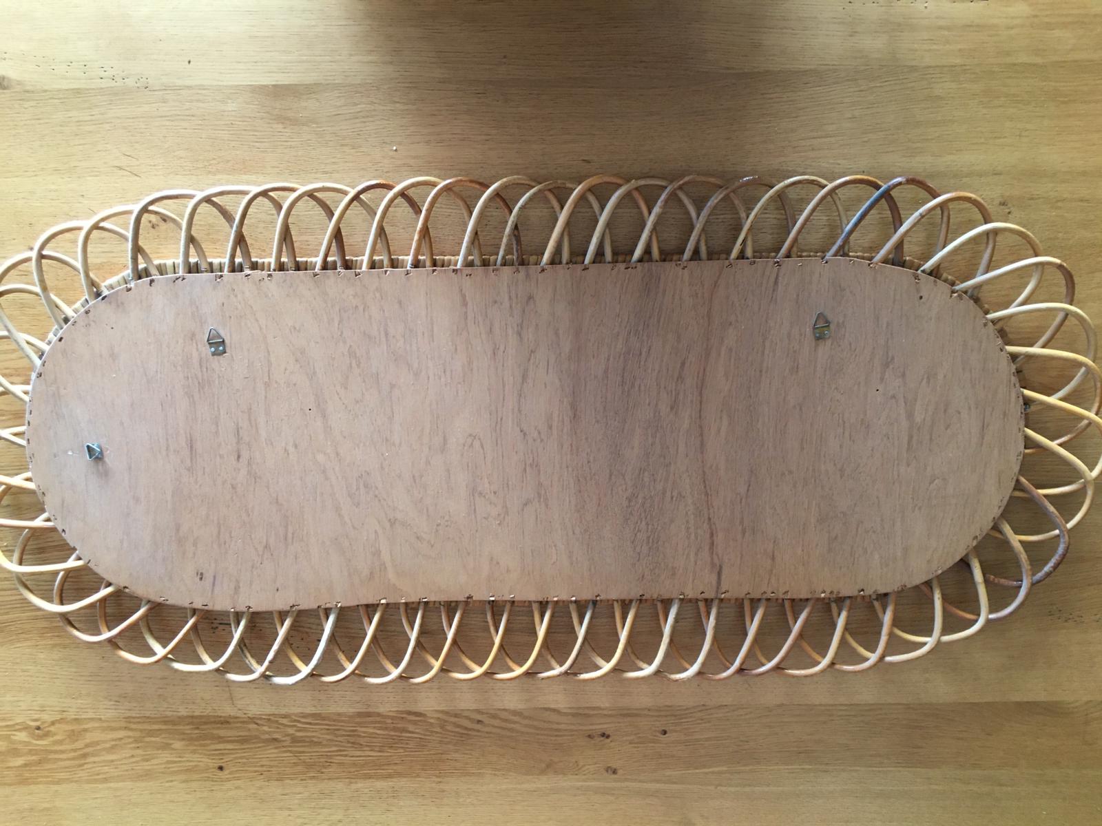 Oval mirror in vintage rattan