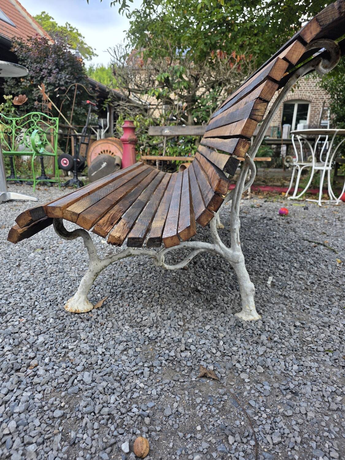 Cast iron and oak slatted garden bench