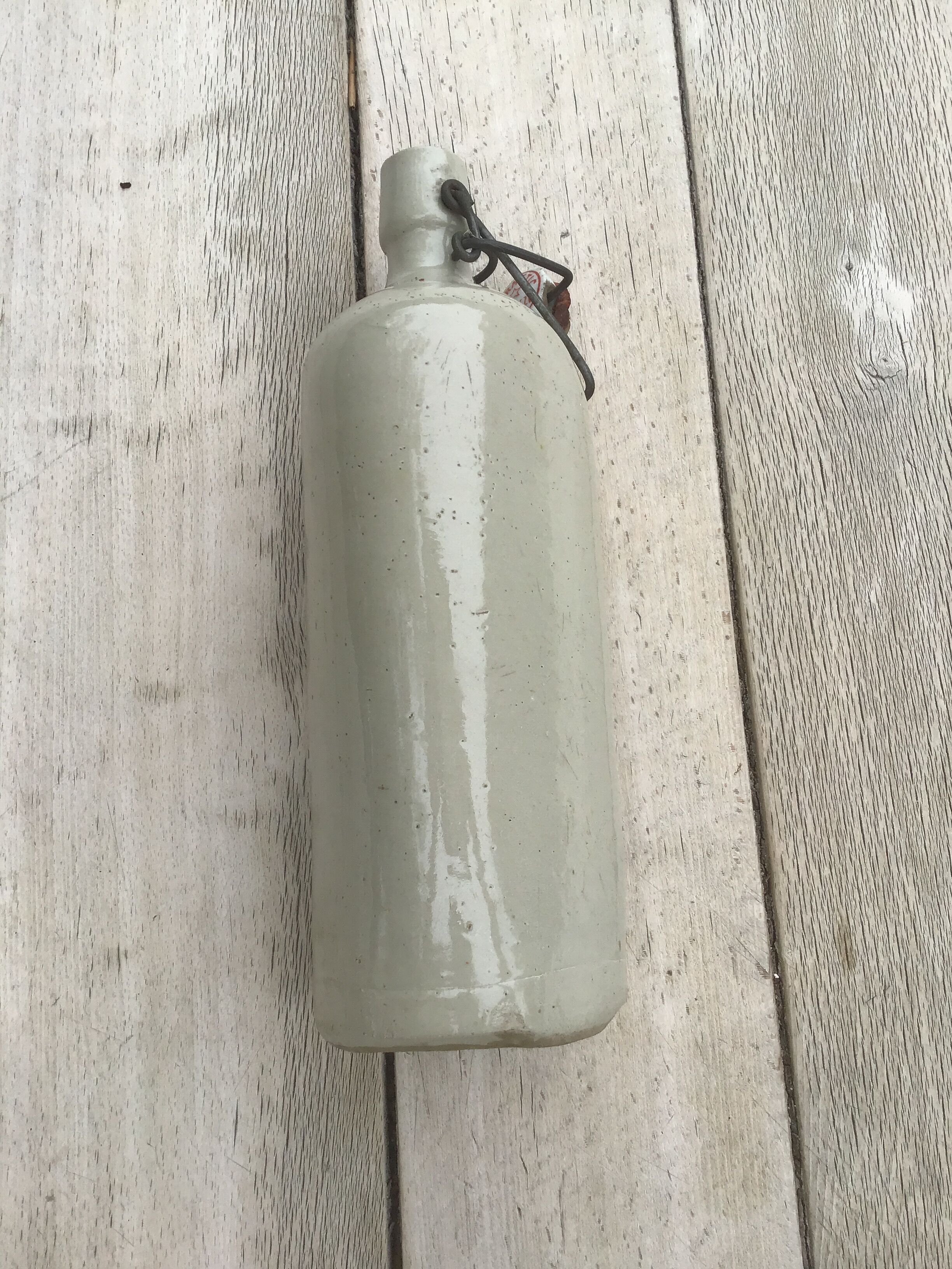 Triangle shaped sandstone bottle