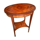 Oval pedestal table with a drawer and a tablet decorated inlaid Louis XVI style