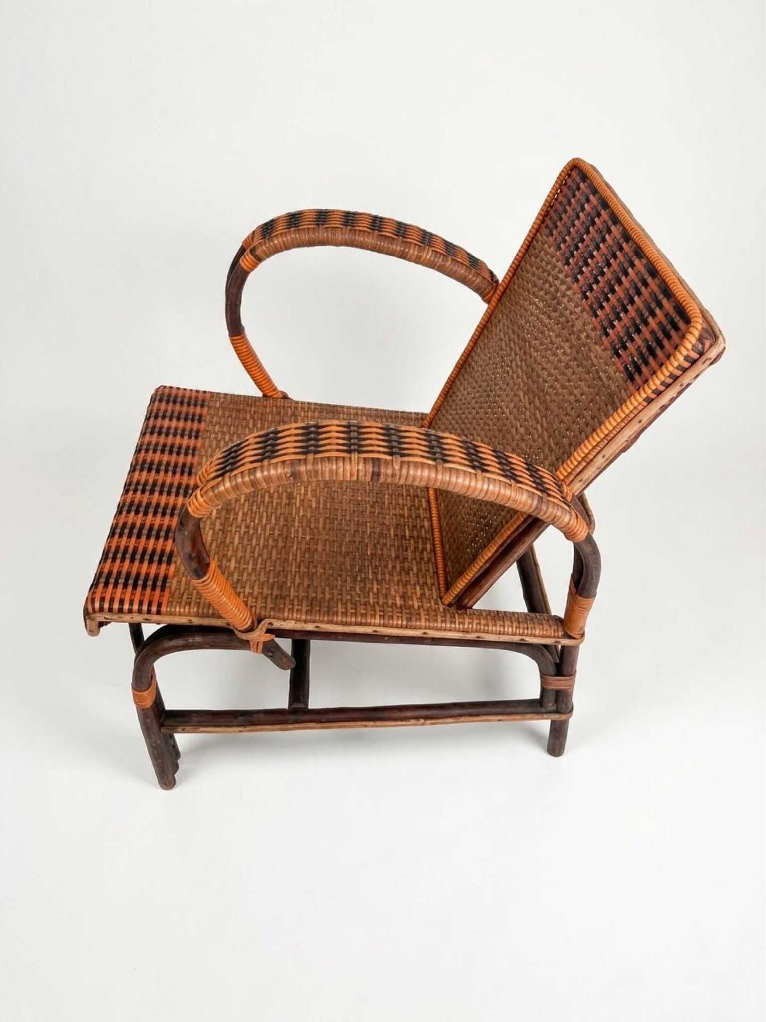 Vintage low armchair in rattan & two-tone weaving 1960s