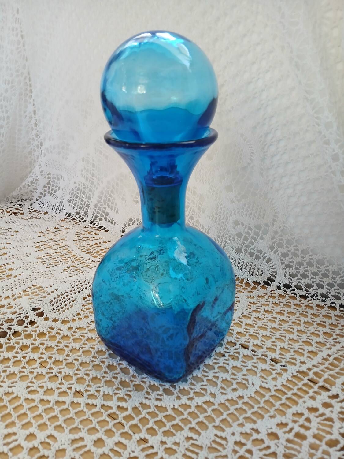 Blue embossed glass carafe