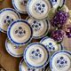 Set of 12 antique flat plates, blue flower decorations