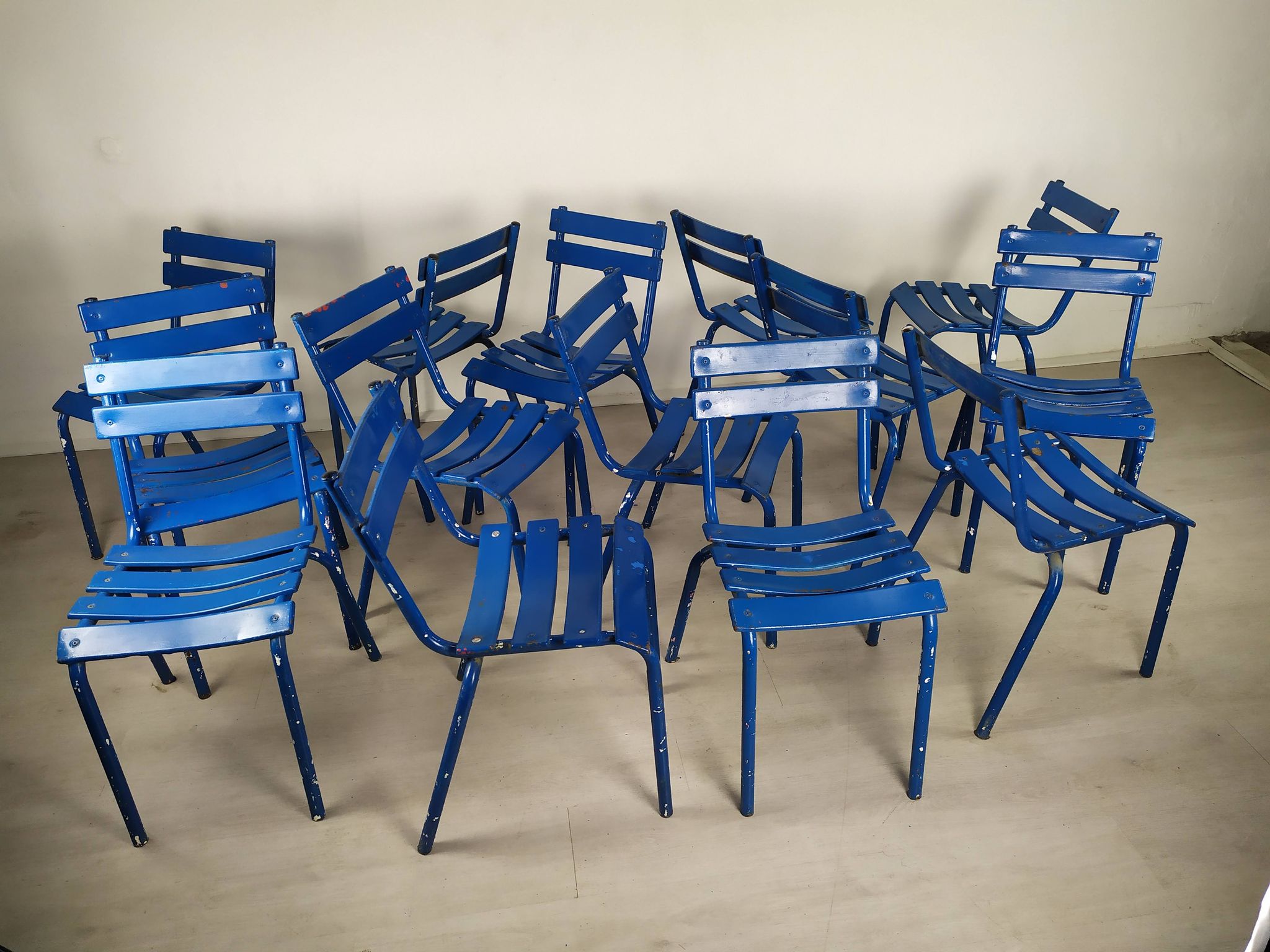14 blue metal bistro chairs