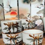 Asian set of a teapot and its cups