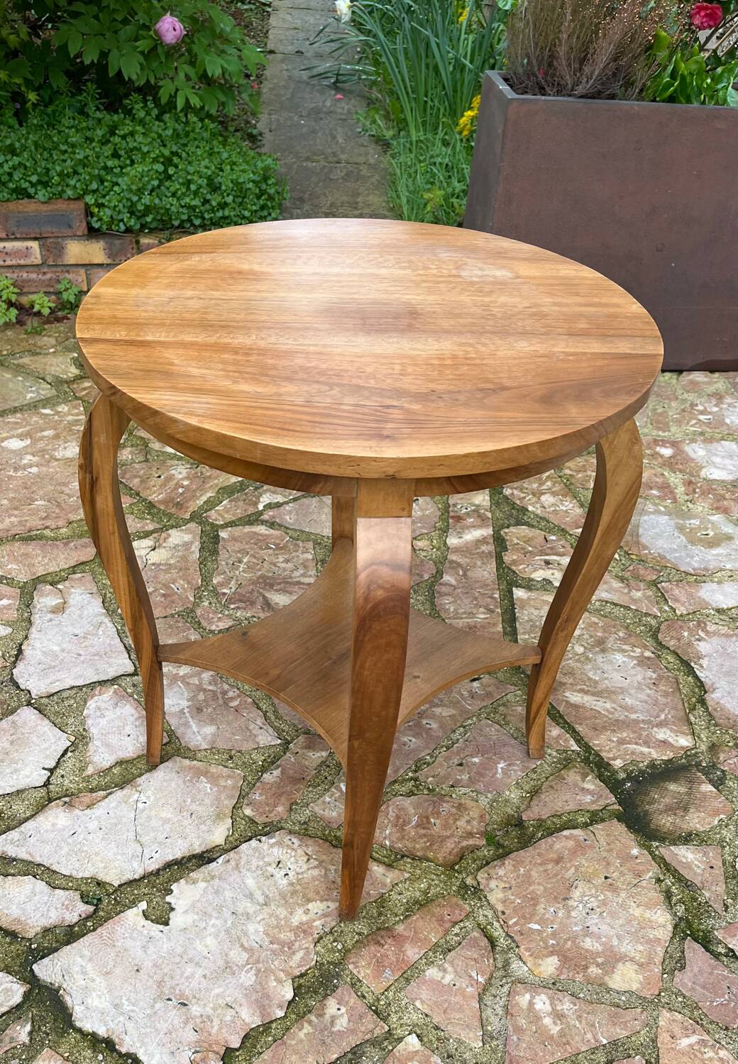 Old wooden pedestal table
