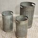 Vintage set of perforated metal waste bins