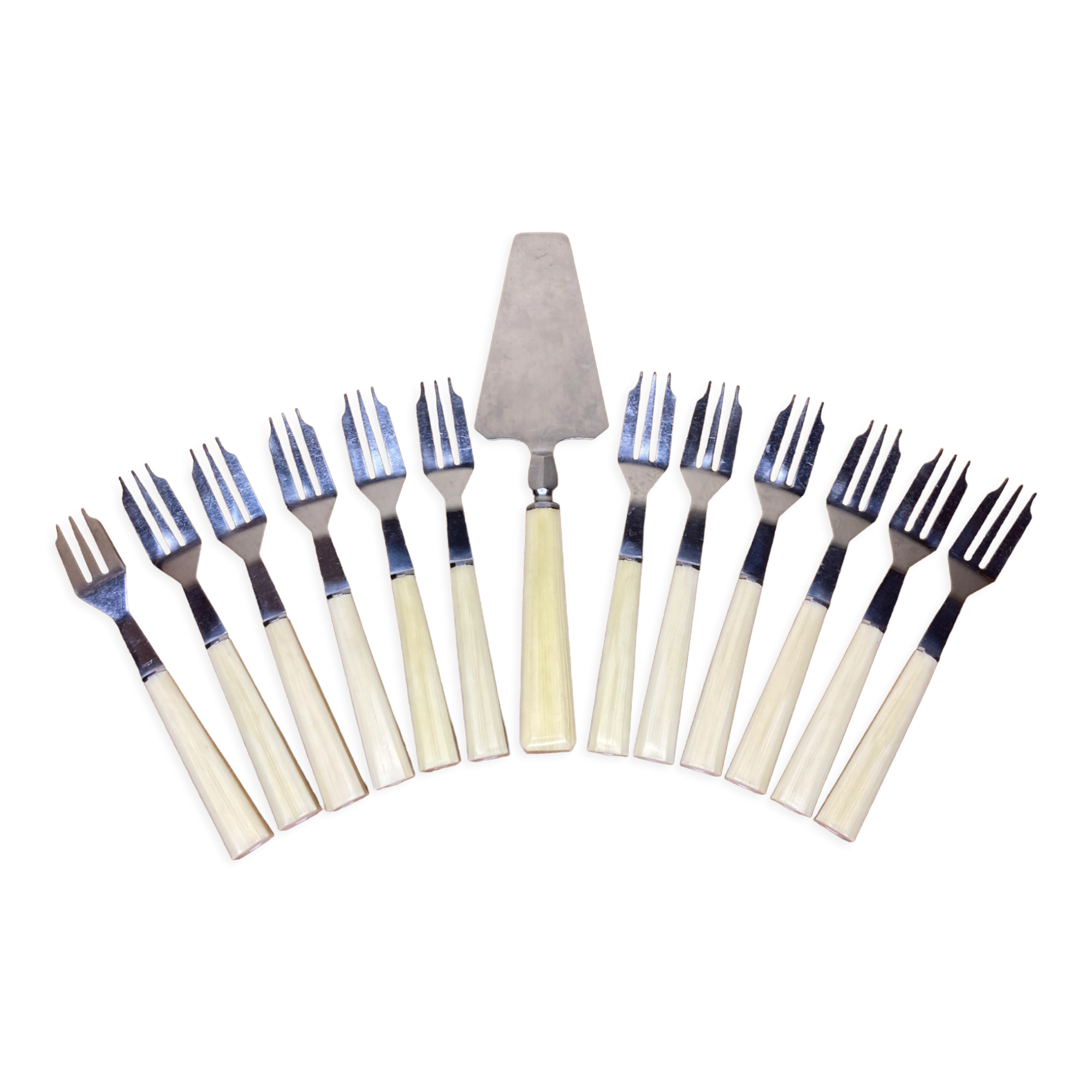 12 dessert forks and stainless steel pie shovel and ecru Bakelite handle
