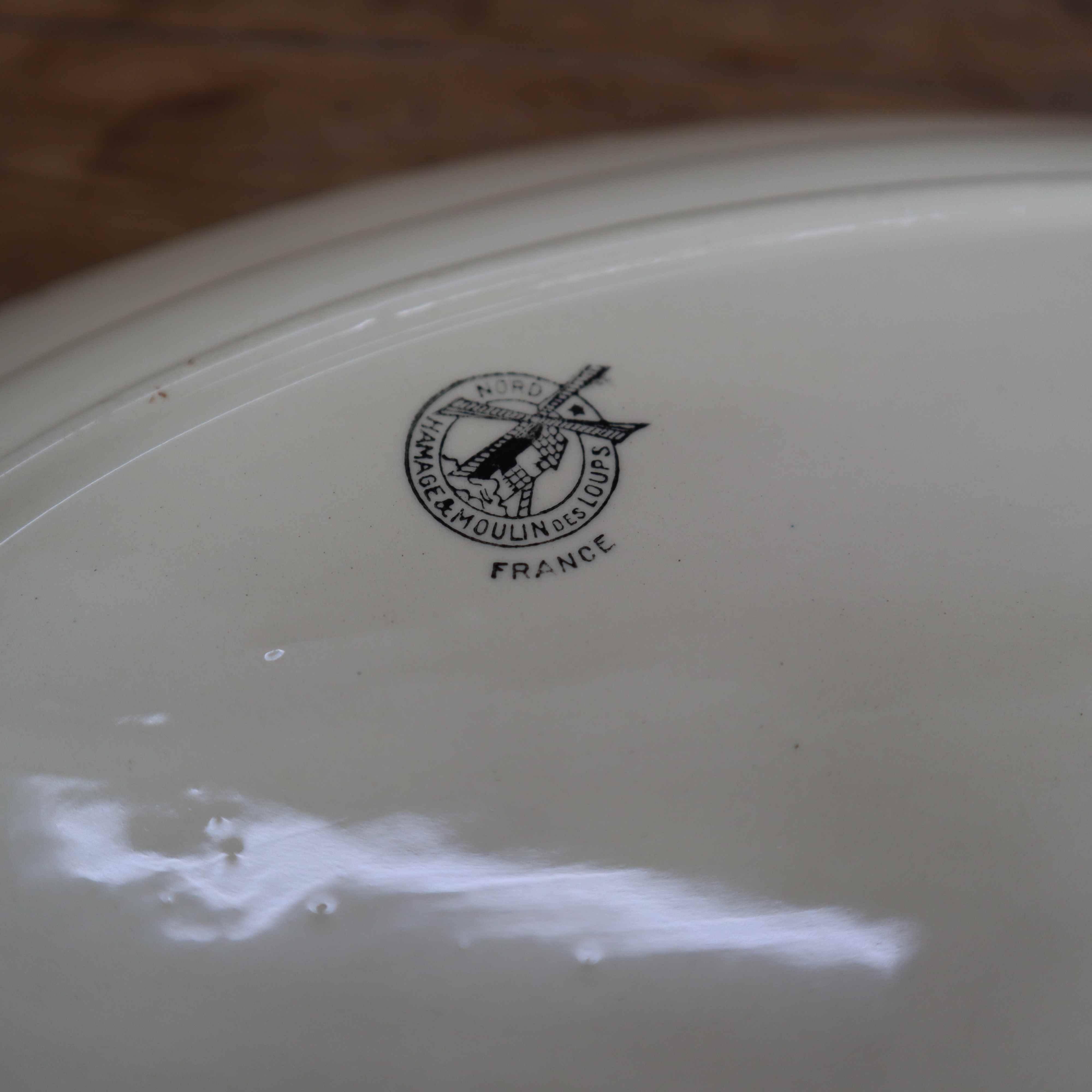 Oval octagonal dish in ecru white earthenware Moulin des Loups