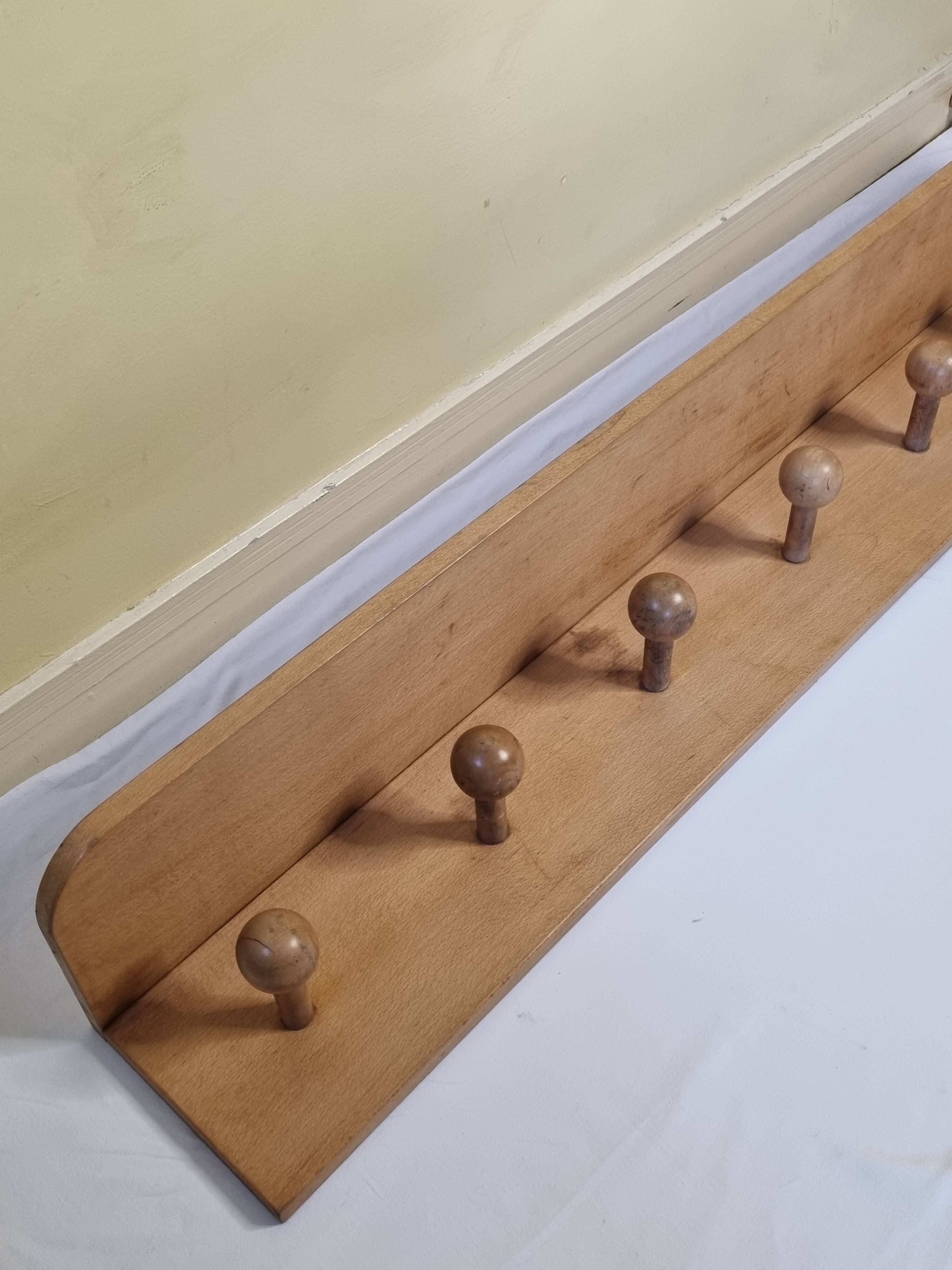 Wall-mounted coat rack, alpine design