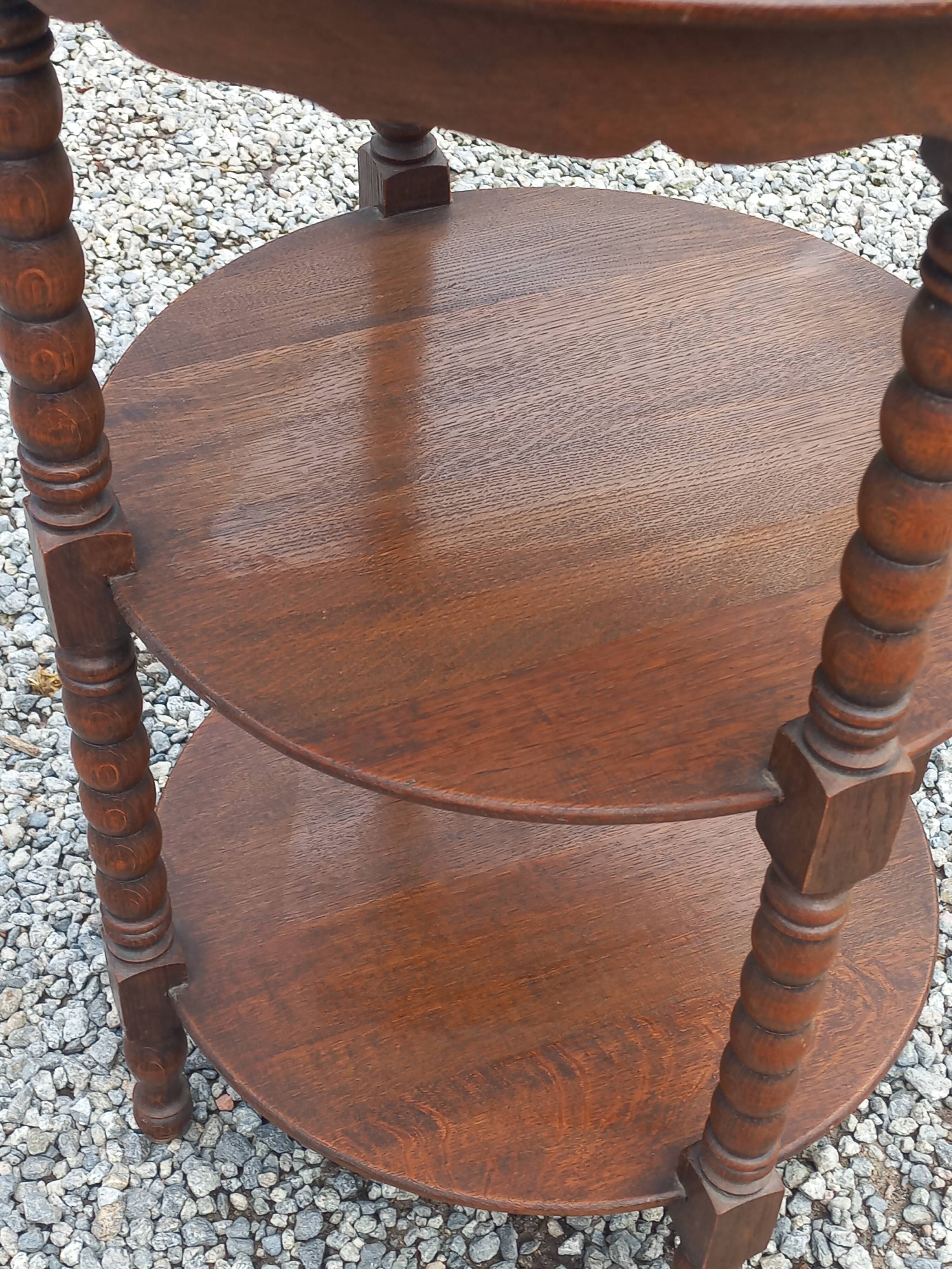 Vintage oak pedestal table with 3 shelves from the 60s